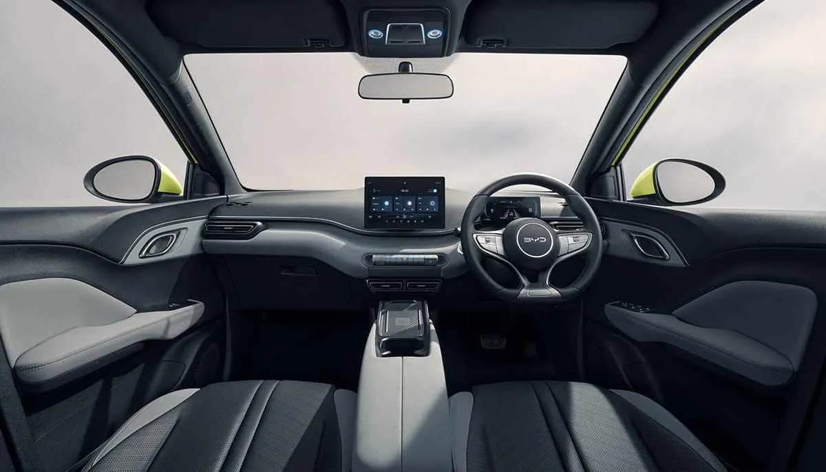 Interior view of the BYD Atto 1 Premium (Long Range) with dashboard and steering wheel.