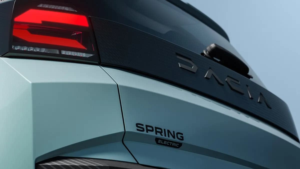 Close-up of the rear of the Dacia Spring Electric showing the tail lamp and brand logo.